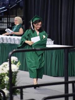 Carley crossing the stage at graduation