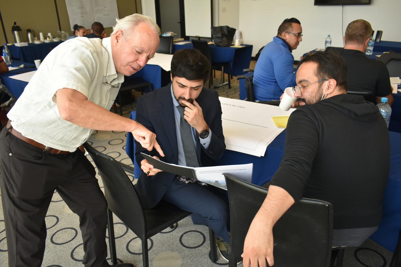 Polus Center CEO Michael Lundquist talking to participants of the Model Coherency human service program design workshop in Colombia
