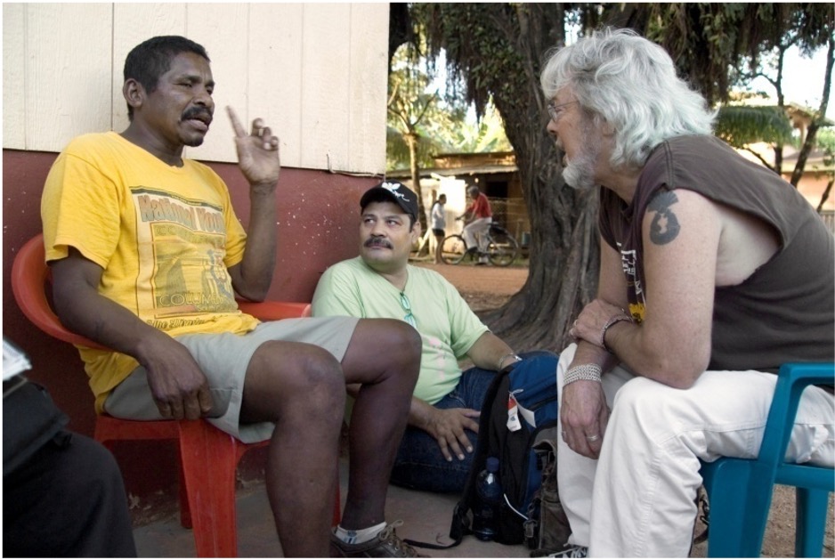 3 men sitting talking (photo by Stephen Petegorsky)