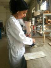 woman working on a prosthetic