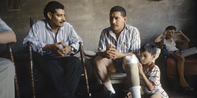 stephen sitting with clinic patients